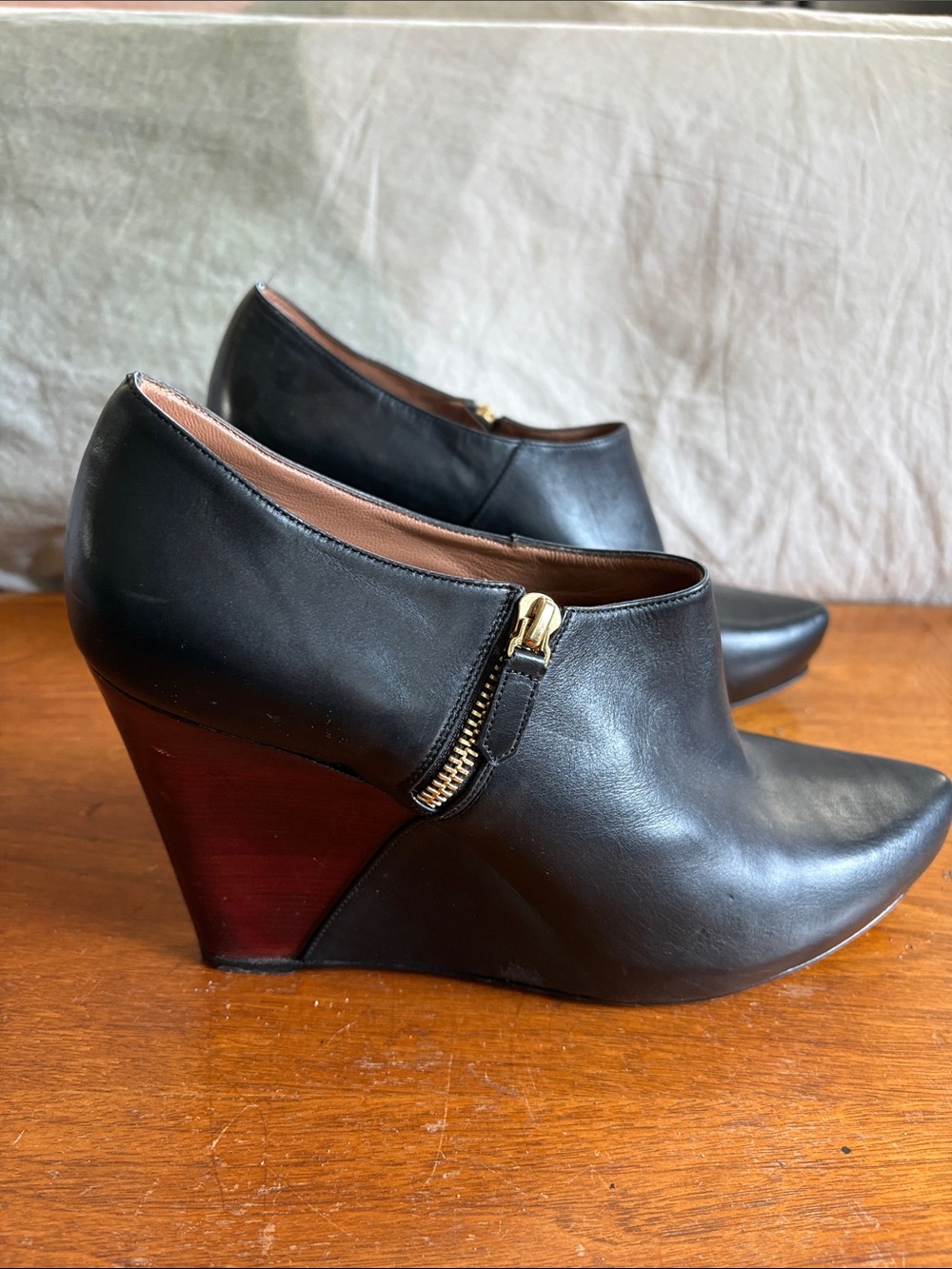 Giorgio Armani Black Leather Pointed Slip-On wedged ankle heels/ bootie’s